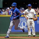 Toronto Blue Jays&rsquo; Josh Donaldson, left, rounds the bases on his home run as Seattle Mariners third baseman Kyle Seager looks on in the first inning of a baseball game Sunday, June 11, 2017, in Seattle. (AP Photo/Elaine Thompson)