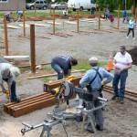 Volunteers work to create the largest community garden in Snohomish County. (Kevin Clark / The Herald)