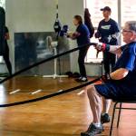At Snohomish Fitness Center, Scott McIntier works with battle ropes (foreground) while others work out on heavy and light bags. (Dan Bates / The Herald)