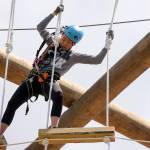 Alexis Song, 15, works the lines at High Trek Adventures at Paine Field Community Park in Everett. (Kevin Clark / The Herald)