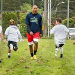 Campers sprint past Seahawks Tyler Lockett Saturday morning at Edmonds-Woodway High School. (Kevin Clark / The Herald)