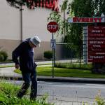 After walking past the Everett Mall, Williams makes his way to 100th Street SE. Since May 2, 2002, Williams has walked six miles each day, always following the same routes. (Dan Bates / The Herald)