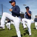 The boys of summer loosen up during the Aquasox&rsquo;s first day of training at Everett Memorial Stadium in Everett on June 11, 2017. (Kevin Clark / The Herald)