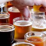 Microbrew samples at Sound to Summit are featured during the inaugural Soho Brew Tour in Snohomish on June 24. (Kevin Clark / The Herald)