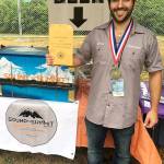 Sound to Summit brew master Grady Warnock wears the gold medal the Snohomish brewery&rsquo;s Wild Willy Wee Heavy won at last year&rsquo;s Washington Brewers Festival. (Photo courtesy of Sound to Summit)