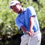 Alvin Kwak chips during the second round of the Snohomish County Amateur Golf Tournament on May 28. (Kevin Clark / The Herald)