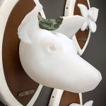 &ldquo;Critical Masse&rdquo; involves glass &ldquo;ghost animals&rdquo; - such as this African wild dog - that are part of O&rsquo;Dell&rsquo;s focus on endangered species. The little bird is reminiscent of the oxpecker birds that sit on rhinos in the wild and warn the beasts about predators.