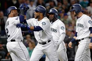 Moore solid in debut, Cano homers twice, M’s win 5th straight