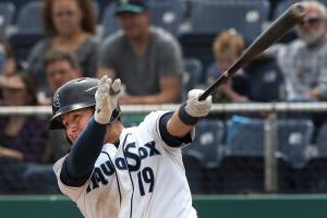 Aquasox catcher Juan Camacho hits a solo home run in the seventh inning as the Everett Aquasox lost 9-2 to the Hillsboro Hops at Everett Memorial Stadium on Monday, June 19, 2017 in Everett, Wa. (Andy Bronson / The Herald)