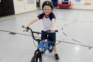 Mountlake Terrace cops help boy get back on a bike