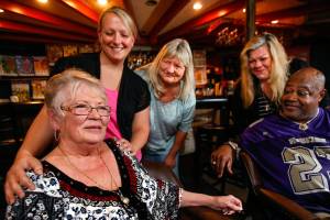 Sue Brauch, (left) a bartender for more than 50 years, is joined and celebrated by friends and colleagues Monday at Patty&rsquo;s Eggnest, the longtime Chuckwagon Inn, on Evergreen. Behind Brauch at left is new bartender Tricia Flood, her mother and customer Linda Flood, restaurant manager Pam Gahan, and loyal customer Dwight Jeffries. Brauch, 76, is retiring this week after 13 years behind the bar at the Everett lounge and restaurant. (Dan Bates / The Herald)