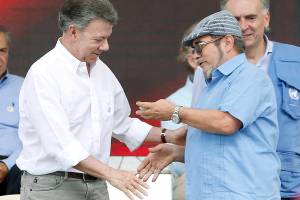 Colombia takes big step to peace as rebels lay down guns