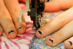 Volunteers package hygiene kits for women around the world