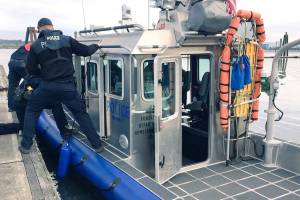 Everett man rescued after falling off fishing boat