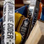 Beer tap handles in sit in alphabetical boxes at The Independent on Hewitt Avenue on April 7 in Everett. (Andy Bronson / The Herald)