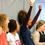 Jennifer Reyes celebrates the recycling of the ballots during the meeting of the Everett Education Association Thursday afternoon at Cascade High School Everett on June 1. (Kevin Clark / The Herald)