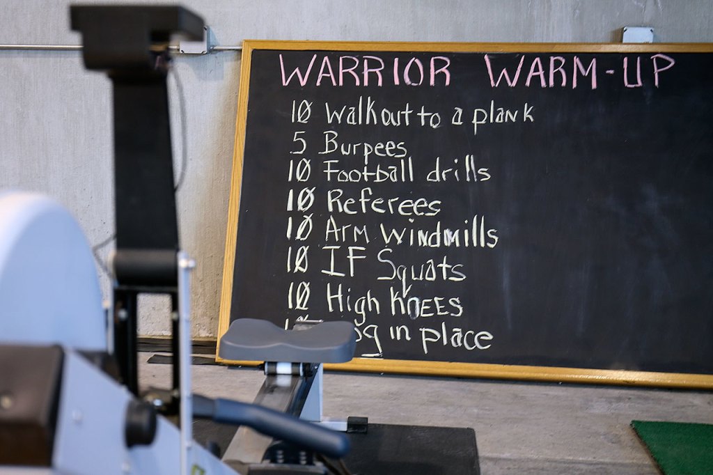 Clients start off with the Warrior Warm-Up before their workout at Immortals Fitness. (Kevin Clark / The Herald)