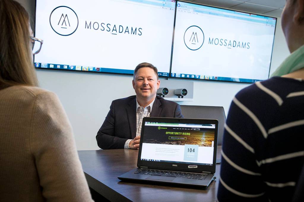 Along with a remodel of its Everett office, Moss Adams also launched new branding and a reworked website in June. (Ian Terry / The Herald)