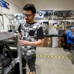 Nathan Rivera assembles an AMC-20 portable dental unit at Aseptico&rsquo;s factory in Woodinville. (Ian Terry / The Herald)