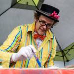 Ball paints outside Solie Funeral Home & Crematory as part of the Everett Art Walk. (Kevin Clark / The Herald)