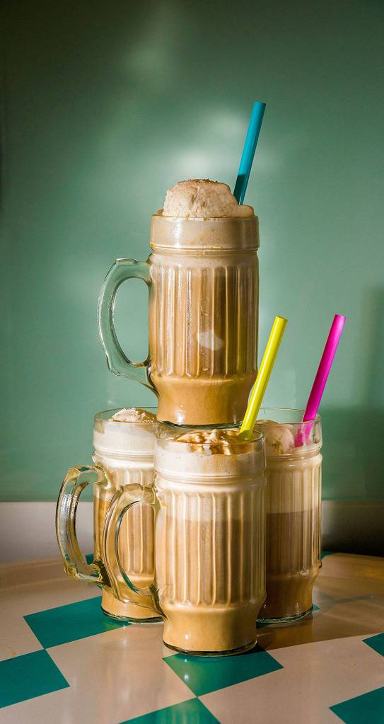 The Cold-Brew Coffee Float brings together 4 ounces each of cold-brew coffee concentrate and club soda, with two scoops of ice cream and, if so desired, a coffee liqueur. (Roy Inman/Kansas City Star)