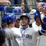 Seattle&rsquo;s Nelson Cruz is congratulated after hitting a home run during a July 9 game at Safeco Field. (AP Photo/Elaine Thompson)