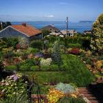 This year&rsquo;s tour of gardens and quilts features Janice Tallman&rsquo;s garden, which is so packed with blooms that people call it &ldquo;the Butchart Garden of Everett.&rdquo; The view from her yard is great, too. (Dan Bates / The Herald)