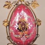 This unusual watch holder, 11 inches high, sold for over $700. It had minor wear and unusual color. (Cowles Syndicate Inc.)