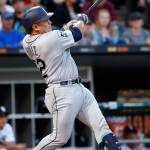 Seattle&rsquo;s Carlos Ruiz hits an run-scoring single in the fifth inning of Saturday&rsquo;s game in Chicago. (AP Photo/Nam Y. Huh)