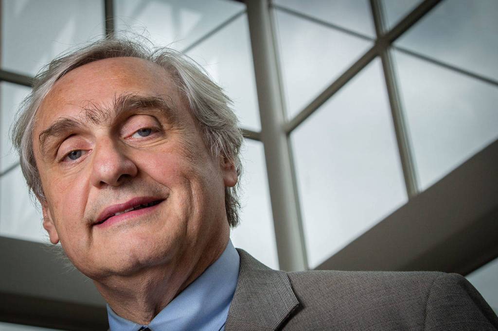 Chief Judge of the U.S. Court of Appeals for the Ninth Circuit Alex Kozinski poses for a portrait in the lobby of a Washington office building in this 2014 file photo. The nation&rsquo;s largest federal court circuit is set for its annual meeting Monday, July 17, after a contentious six months that has seen its judges repeatedly clash with President Donald Trump, and its agenda is not shying away from topics that have stoked the president&rsquo;s ire. (AP Photo/J. David Ake)