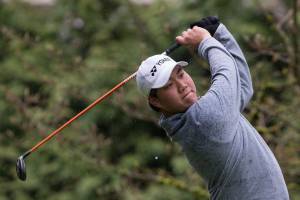 Kamiak&rsquo;s Alvin Kwak chips onto the green during the Dolan Invitational at Everett Golf & Country Club on Monday, April 10, 2017 in Everett, Wa. (Andy Bronson / The Herald)
