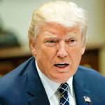 President Donald Trump speaks while having lunch with services members in the Roosevelt Room of the White House in Washington on Tuesday. (AP Photo/Pablo Martinez Monsivais)