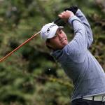 Kamiak&rsquo;s Alvin Kwak chips onto the green during the Dolan Invitational on April 10, 2017, at Everett Golf & Country Club. (Andy Bronson / The Herald)