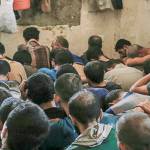 Iraqis hold suspected militants in cramped, stifling prison