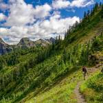 A backpacker hikes near High Pass in the North Cascades. (Photo by Kevin Mack)