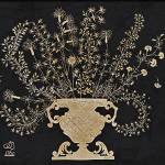 It took a skilled person to cut the tiny branches of flowers in this 18th-century cutwork picture. It is only 12 by 16 inches and sold for $2,460. (Cowles Syndicate Inc.)