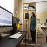 A computer records her voice as Saacha K. Belgar uses her closet as a recording studio when she needs to dampen sound more than usual on Wednesday, May 24, 2017 in Snohomish, Wa. (Andy Bronson / The Herald)