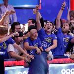 Fans celebrate after Scott Blumstein, bottom center, won the World Series of Poker main event, Sunday, July 23, 2017, in Las Vegas. (AP Photo/John Locher)
