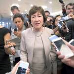 Sen. Susan Collins, R-Maine is surrounded by reporters as she arrives on Capitol Hill in Washington on Tuesday, before a test vote on the Republican health care bill. (AP Photo/J. Scott Applewhite)