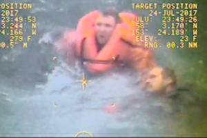 Video shows boat captain’s heroic rescue of crew member