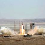 This picture released by the official website of the Iranian Defense Ministry on Thursday claims to show the launching of Simorgh satellite-carrying rocket in an undisclosed location, Iran. (Iranian Defense Ministry via AP)