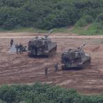 South Korean army soldiers prepare their military exercise in Paju, South Korea, near the border with North Korea, Sunday, July 30, 2017. The United States flew two supersonic bombers over the Korean Peninsula on Sunday in a show of force against North Korea following the country&rsquo;s latest intercontinental ballistic missile test. (AP Photo/Ahn Young-joon)