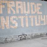 In Caracas, Venezuela, on Monday, a woman walks by a message on a wall formed with Venezuelan currency that reads, in Spanish: &ldquo;The Constituent Assembly is a fraud.&rdquo; (AP Photo/Ariana Cubillos)