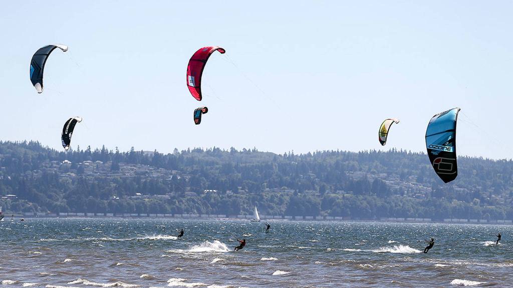 Kites dot the horizon during the Jetty Island Light Wind Olympics 2017 on Jetty Island on June 23. (Kevin Clark / The Herald)