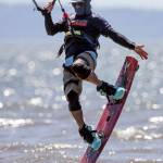 Matt Ewing grabs air during the Jetty Island Light Wind Olympics 2017 on Jetty Island on June 23. (Kevin Clark / The Herald)