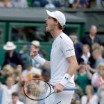 Andy Murray celebrates after defeating Fabio Fognini in a third-round men&rsquo;s singles match Friday at Wimbledon in London. (AP Photo/Alastair Grant)