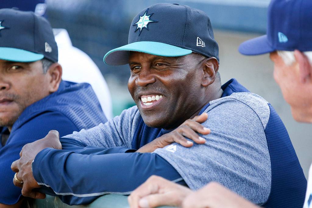 Alvin Davis smiles in the Aquasox dugout Wednesday night at Everett Memorial Stadium. (Kevin Clark / The Herald)