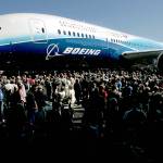 The first Boeing 787 is swarmed by the crowd attending the July 8, 2007, rollout of the plane at the Boeing plant in Everett. (Herald file)