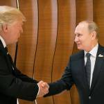 U.S. President Donald Trump (left) shakes hands with Russian President Vladimir Putin before the first working session of the G-20 summit in Hamburg, Germany. (Steffen Kugler/Presse- und Informationsamt der Bundesregierung via AP)