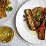 Grilled eggplant on &ldquo;hummus&rdquo; features a spread made with pistachios and edamame instead of chickpeas. (Photo by Deb Lindsey for The Washington Post)